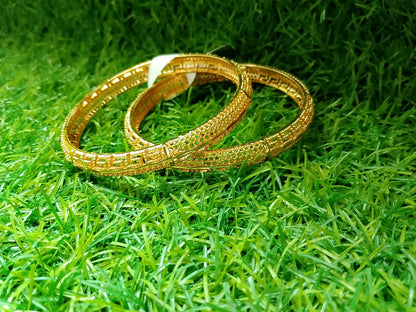 The Gold-Tone Geometric Statement Bangle Set