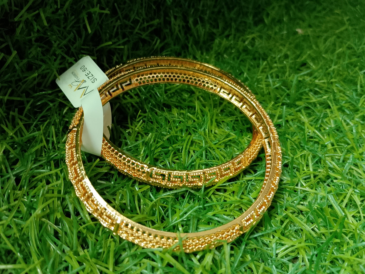 The Gold-Tone Geometric Statement Bangle Set