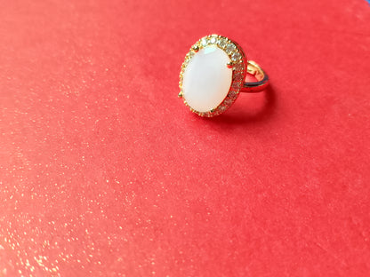 Elegant Gold-Plated Ring with a Dazzling Oval Gemstone