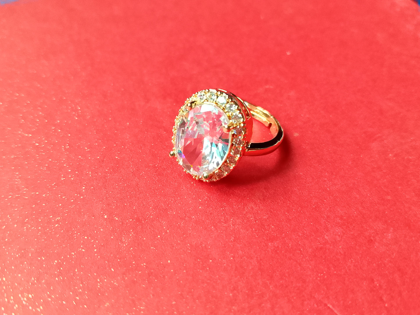 Elegant Gold-Plated Ring with a Dazzling Oval Gemstone