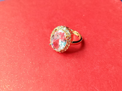 Elegant Gold-Plated Ring with a Dazzling Oval Gemstone