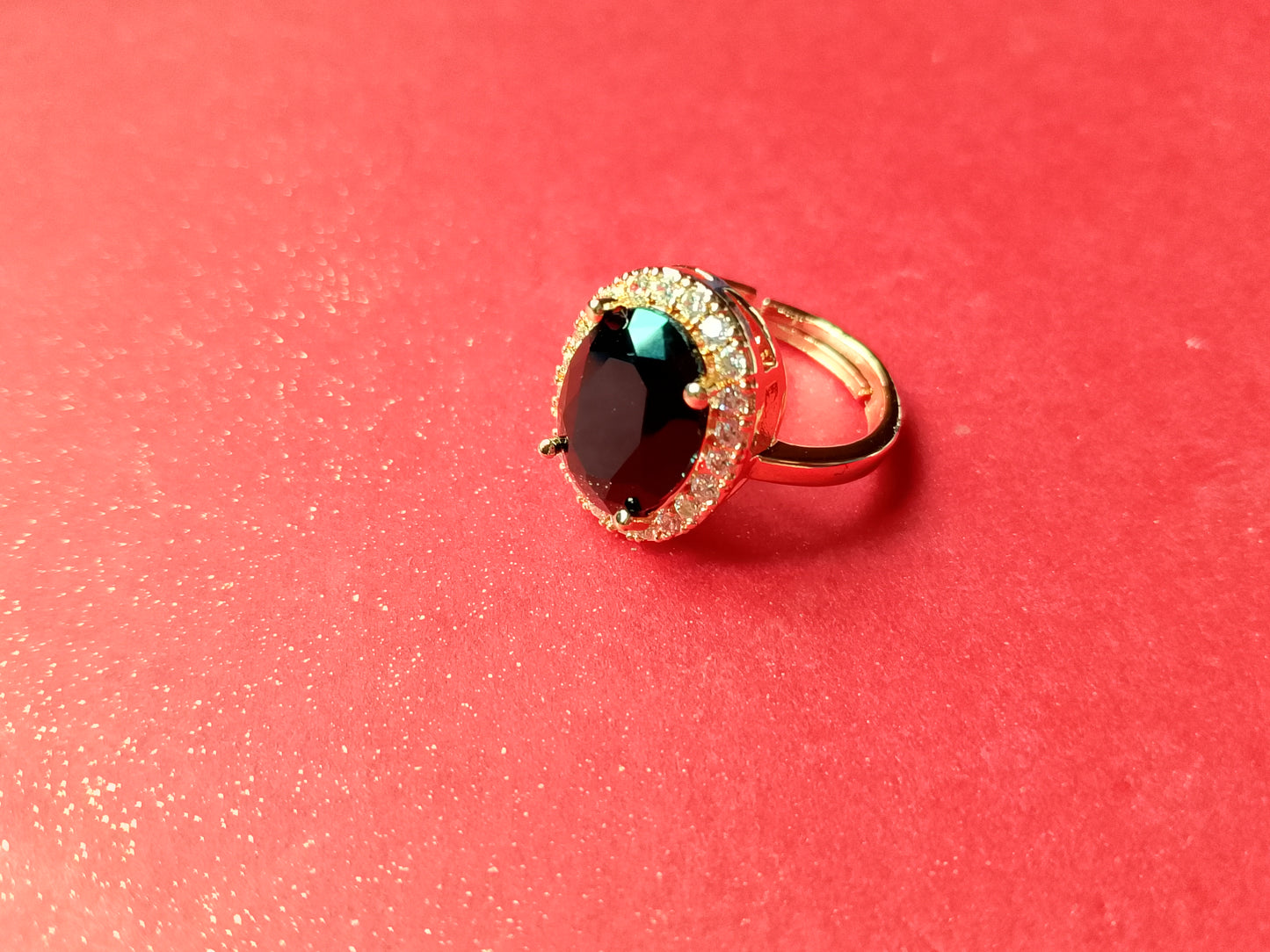 Elegant Gold-Plated Ring with a Dazzling Oval Gemstone
