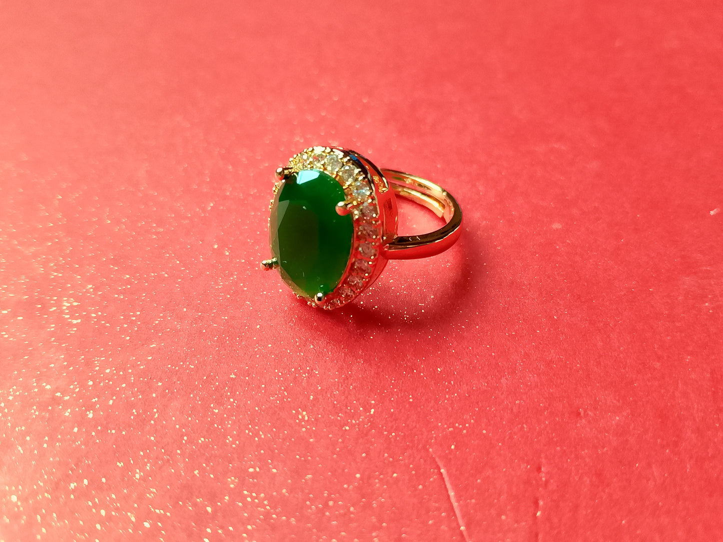 Elegant Gold-Plated Ring with a Dazzling Oval Gemstone