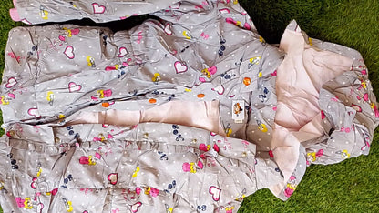 Girls' Reversible Puffer Jacket | Pink Fleece Lining & Grey Cartoon Print